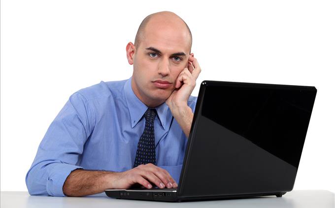 frustrated man with laptop