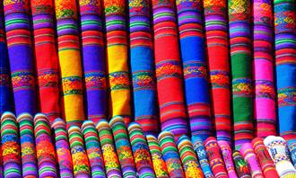 colorful rolled-up carpets