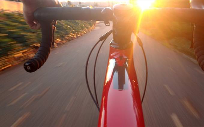 riding a red bike