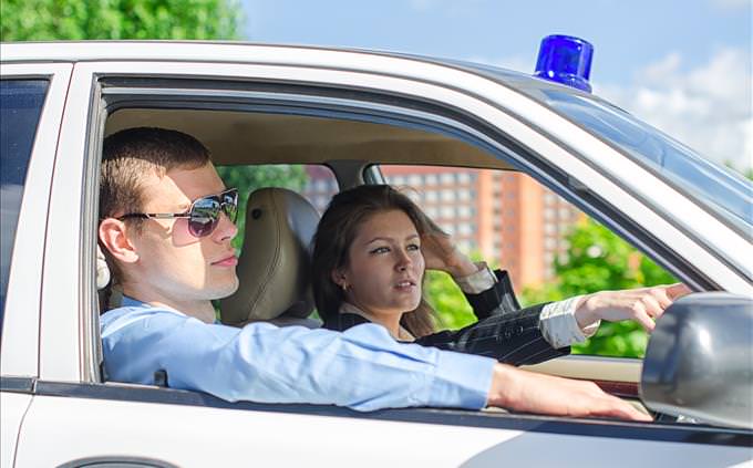 police officers in car