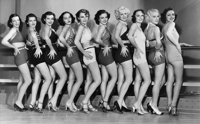 monochrome 1950s dancers in a line
