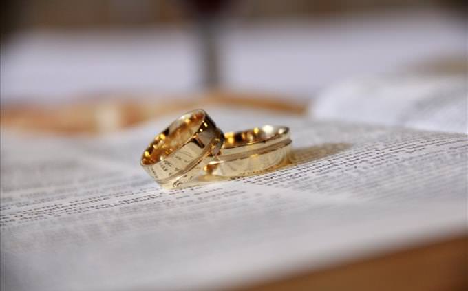 gold rings on Bible