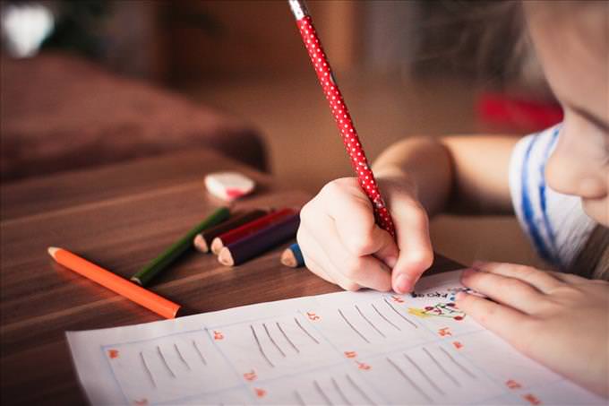 young girl doing homework