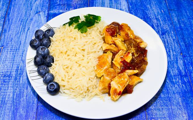 chicken dish with rice and blueberries