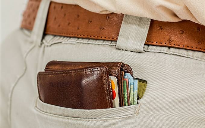 wallet in trouser pocket