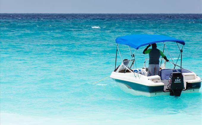 man on motor boat