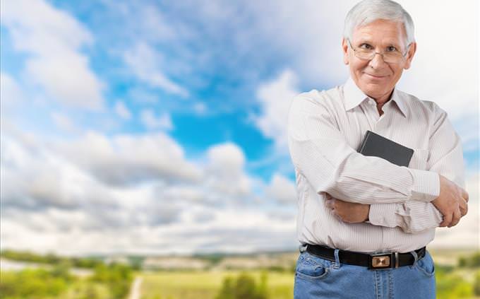 senior man in front of serene background