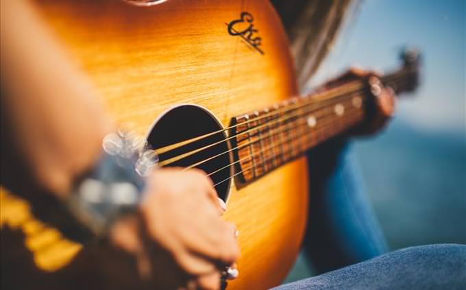 man playing guitar