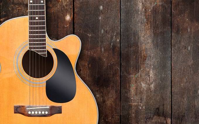 guitar on wooden background