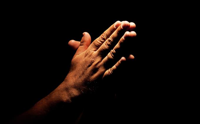 hands held together in prayer
