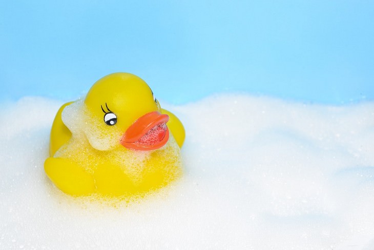 rubber duck in bubble bath