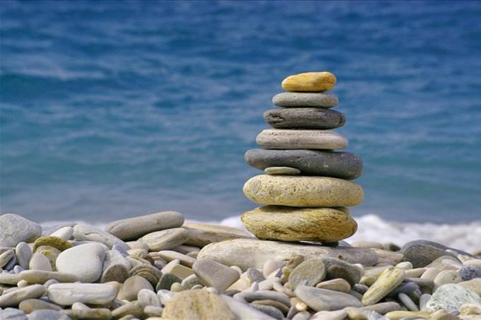 pile of pebbles by the ocean