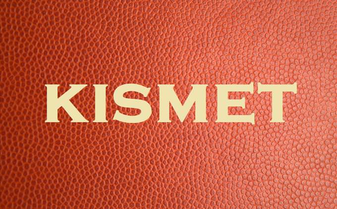 'kismet' on red leather background