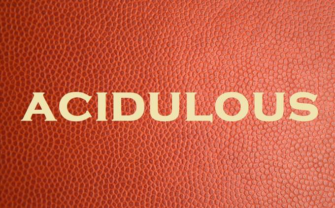 'acidulous' on red leather background