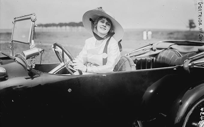 vintage photo of lady driving car