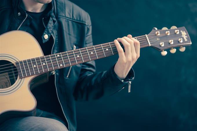 A woman with a guitar