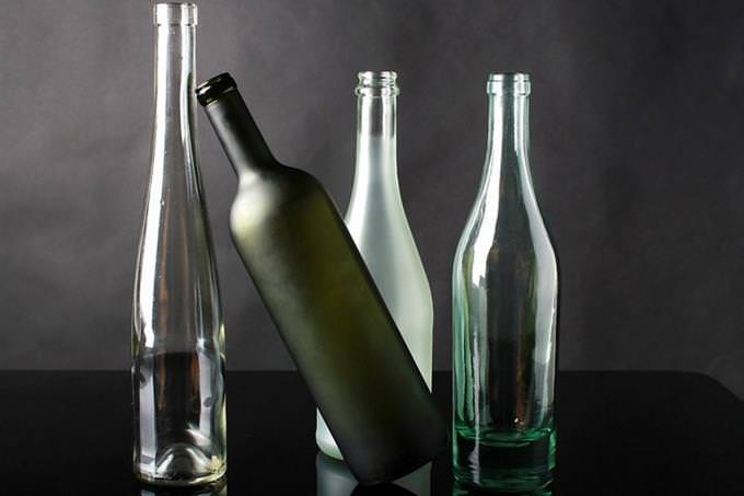 Four glass bottles