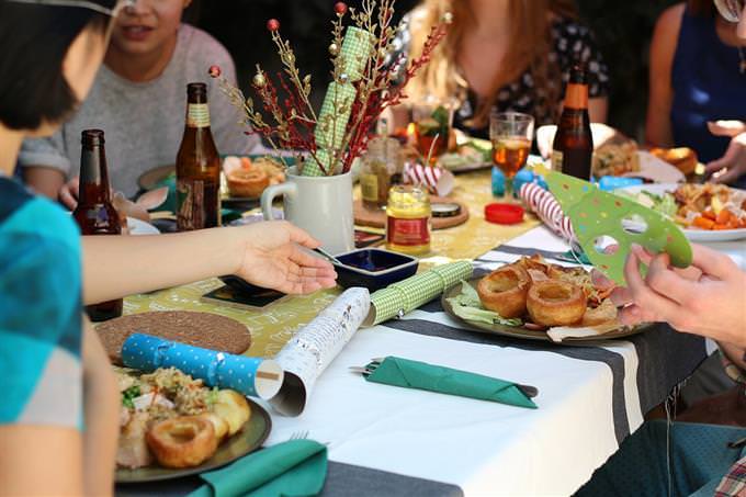 People sit and eat around a table