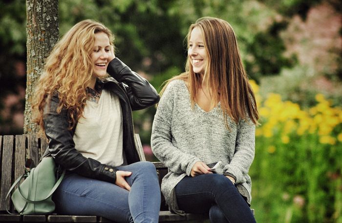 two women smiling 