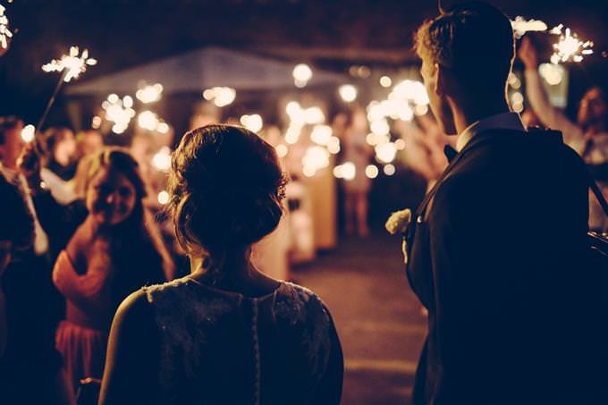 A couple entering a wedding hall