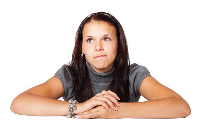 A woman looking pensively