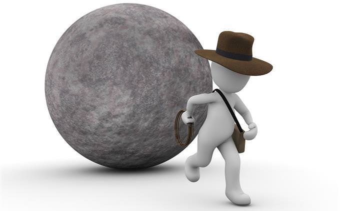 A digital illustration of a man escaping from a stone ball