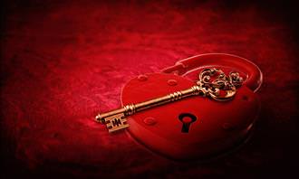 key on heart-shaped lock