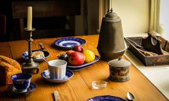 Find the differences: table with food and dishes on it