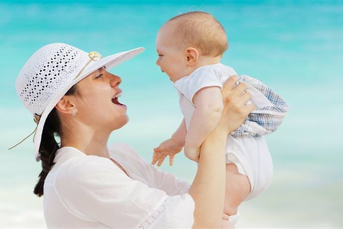 woman holding baby