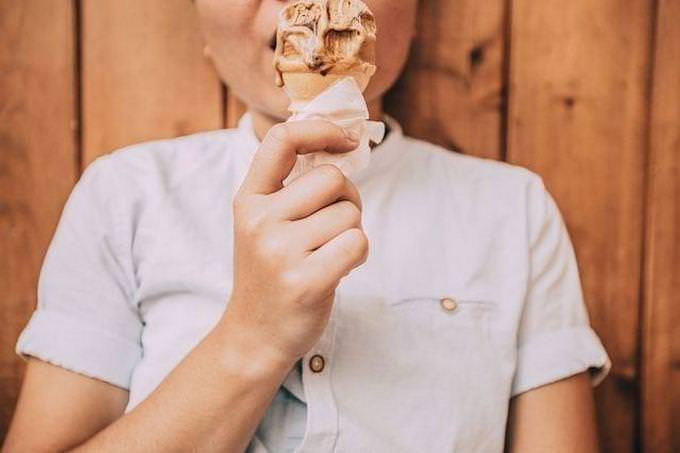 a kid eating ice cream