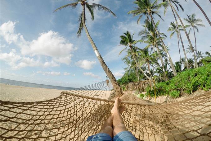 Picture from the perspective of a man lying on a hammock
