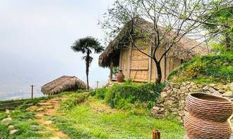 Walkway to a rustic-style wooden house