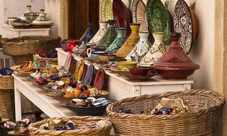 Tajine with spices for sale in the market of Marrakech