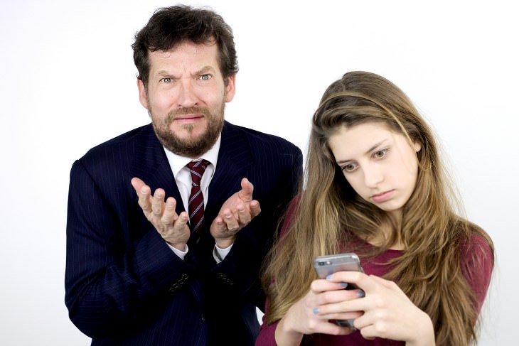 frustrated father angry with his teenage daughter