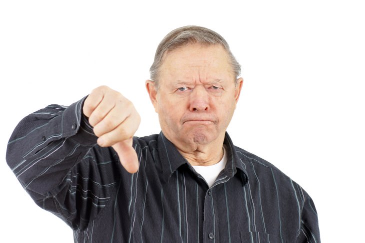 angry old man giving thumbs down