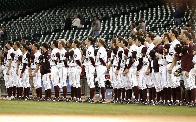 A baseball team singinf