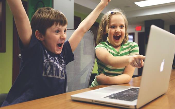 excited kids on PC