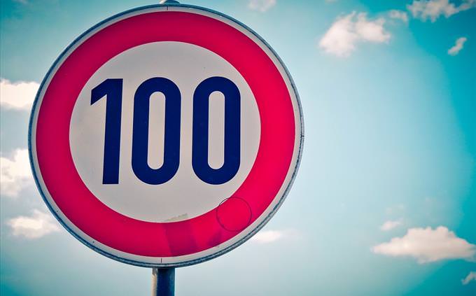 100 speed limit sign
