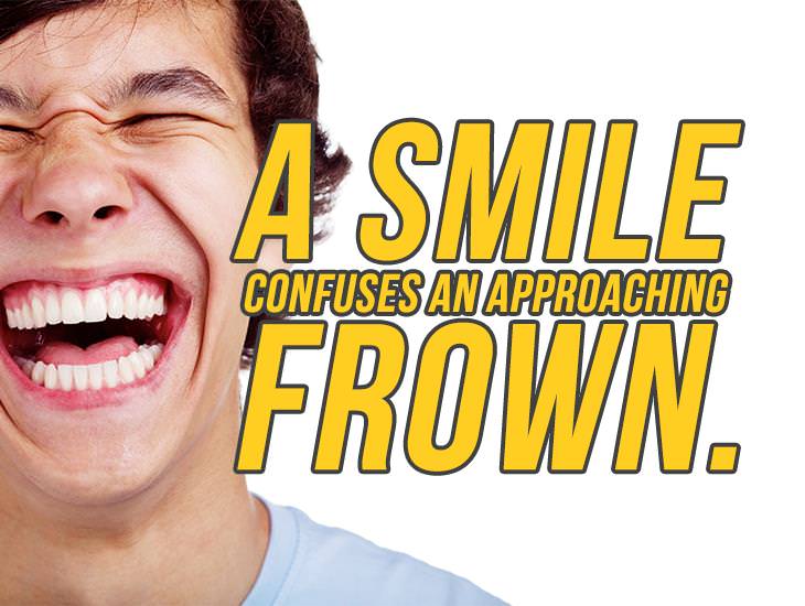 A Smile Confuses An Approaching Frown.