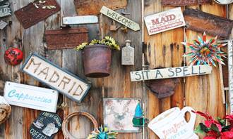 A wall with a bunch of different things hung on it