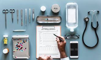 A table with different doctors’ tools on it