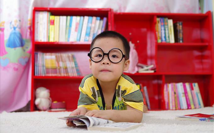smart Asian child with glasses
