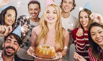 People celebrating a birthday with a cake