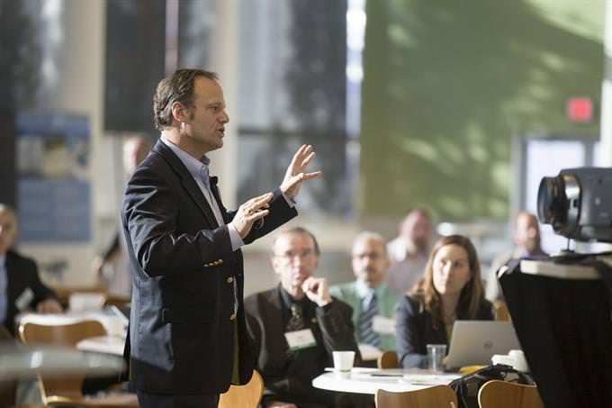 A person delivering a lecture in a workplace