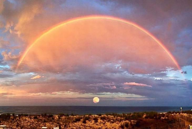 optical illusions rainbow over a sunset
