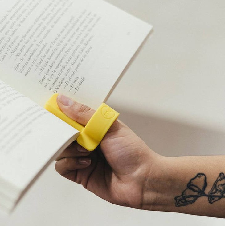 useful design innovations  one handed book holder