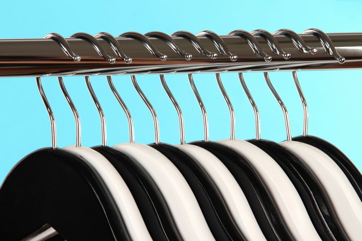 Organization Hacks to Declutter Your Closet hangers facing out