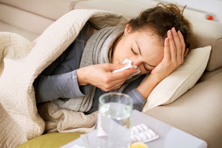 Myths about the Cold and Flu woman with a cold
