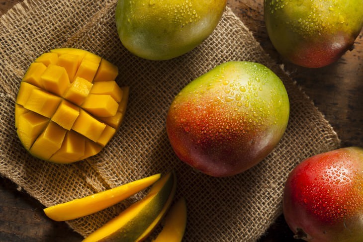 healthy foods that can be toxic mango cut up and whole