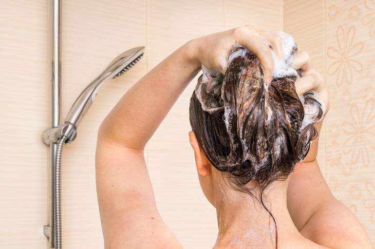 bad habits for skin and hair woman shampooing hair